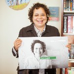 Ruth Tobar holds up her poster